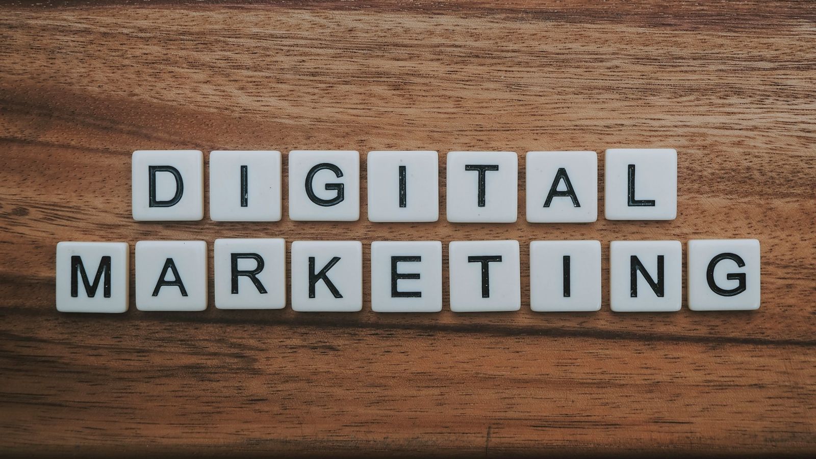 Digital marketing artwork on a brown wooden surface.